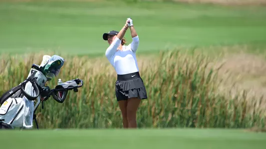 Charlotte Brook Swings a Club at the NCAA Golf Championships