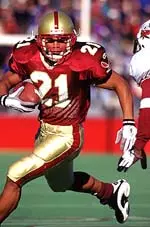 Mike Cloud Rushes<BR> for an all-time lead.