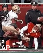 Brock Williams breaks up <BR> pass intended Jermaine Walker.