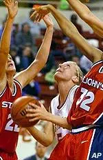 Becky Gottstein looks to score through the defense of St. John's defenders in the second half of the 67-50 Eagle win Wednesday.