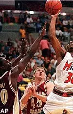 Boston College's Uka Agbai tries to block the shot of Miami's Vernon Jennings on Saturday.