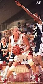 Boston College's Jamie Cournoyer tries to drive around Pittsburgh's Nickeia Morris in the first half Saturday.