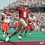 Right cornerback, Lenny Walls returns one of four interceptions thrown by Syracuse, 29 yards for a touchdown late in the second quarter.