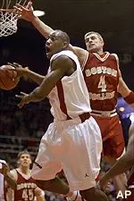 Jonathan Beerbohm defends against St. John's Lavor Postell during the first half Saturday.