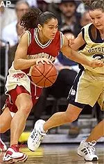 Boston College's Brianne Stepherson drives the lane against Notre Dame's Alicia Ratay during first half action Saturday.