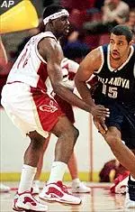Uka Agbai defends against Villanova's Malik Allen during the first half Saturday.