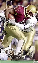 Running back William Green carries the ball as two Notre Dame safeties try to bring him down during the fourth quarter. Green rushed for 195 yards on 28 carries to help Boston College beat Notre Dame 21-17.