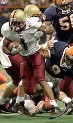 Running back William Green breaks free from Syracuse defenders on his way to a touchdown during the first quarter.