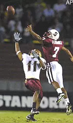 Dedrick Dewalt goes for a pass from quarterback Brian St. Pierre in the loss to Stanford.