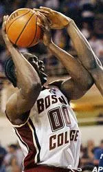 Uka Agbai tries to shoot over Connecticut's Emeka Okafor in the first half, Monday.