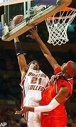 Kenny Walls takes a shot as Rutgers' Herve Lamizana defends during the first half.