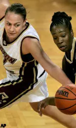Kathrin Ress reaches for the ball against George Washington forward Jessica Simmonds.
