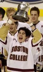 Brian Boyle hoists the Beanpot trophy after BC's 2-1 overtime win over BU.