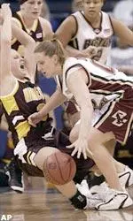 Jessalyn Deveny collides with Minnesota's Kelly Roysland as she tries to drive to the basket.