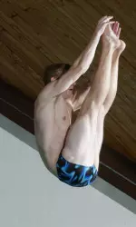 Christopher Wilson-Byrne won the 1-meter dive against Holy Cross on Tuesday.