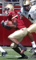 Boston College's Will Blackmon, works his way past Army defenders, for a 41-yard touchdown during the second quarter Saturday, Sept. 10, 2005, as Boston wins 44-7. (AP Photo/Lisa Poole)
