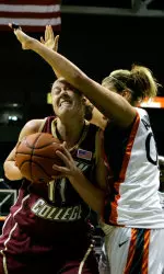 Kathrin Ress is fouled by Miami Amy Audibert during the first half.
