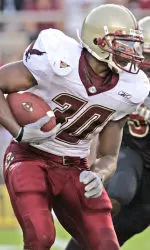L.V. Whitworth runs for fourth-quarter yardage. (AP Photo/Phil Coale)
