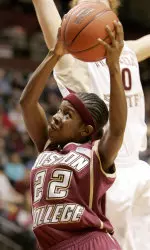 Brittanny Johnson gets past the Florida State defense for two points in the first half. (AP Photo/Steve Cannon)
