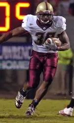 L.V. Whitworth looks for room upfield in the first half.