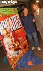 Doug Flutie and Gerard Phelan share a laugh after the unveiling of the commemorative Wheaties box.