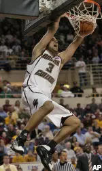Boston College's Jared Dudley reacts as he scores against Virginia during the second half of a college basketball game Saturday, Jan. 13, 2007, in Boston. Dudley was the high scorer for Boston College at they won won 78-73. (AP Photo/Lisa Poole)