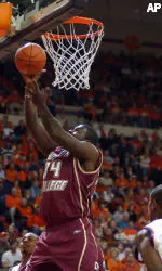 Boston College's Shamari Spears, left, scores past Clemson's Trevor Booker in the first half of a college basketball game, Saturday, Jan. 20, 2007, in Clemson, S.C. (AP Photo/Emily Horos)