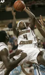 Tyrese Rice drives toward the basket in the first half.