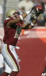Rich Gunnell makes a catch against Virginia Tech during the first quarter. (AP Photo/Phil Coale)