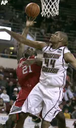 Boston College center Tyrelle Blair (44) tries to block a shot by Sacred Heart forward Ryon Howard during the first half
