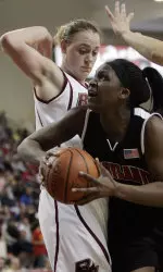 Maryland's Crystal Langhorne, right, shoots over Boston College's Kathrin Ress, left, during the first half of a college basketball game in Boston, Sunday, Feb., 25, 2007. (AP Photo/Chitose Suzuki)