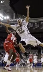 Texas Tech's Darryl Dora (44) fouls Boston College's Sean Marshall (23) during their NCAA East Regional first round game at the Lawrence Joel Veterans Memorial Coliseum in Winston-Salem, N.C., Thursday, March 15, 2007. (AP Photo/David J. Phillip)