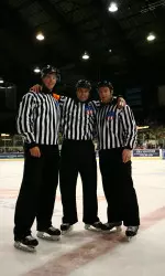 Referee Tim Mayer and Linesmen Andrew Bethmann (left) and Justin Greene (right). <i>Photo courtesy of Whiteshark Photography</i>