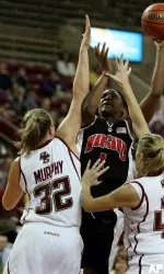 Stefanie Murphy and Rebecca Miles defend against Maryland's Crystal Langhorne. (AP Photo/Mary Schwalm)