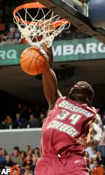 Shamari Spears dunks against Virginia.