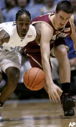 North Carolina's Quentin Thomas and Tyler Roche battle during the first half. (AP Photo/Gerry Broome)