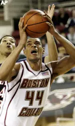 Tyrelle Blair goes for a shot in front of Robert Morris' Dallas Green during the first half.