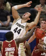 Rakim Sanders strips the ball from Purdue's Nemanja Calasan. (AP Photo/Julie Jacobson)