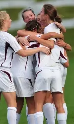 The Eagles celebrate Brooke Knowlton's goal in the firs thalf of the 1-0 win over Duke.