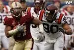 Linebacker Montel Harris (41) runs for 51 yards as Virginia Tech defensive end Orion Martin (90) attempts to tackle.