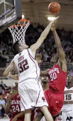 John Oates blocks a shot by Maryland's Bambale Osby during the first half. (AP Photo/Greg M. Cooper)