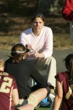 Head Coach Bowen Holden will present her team's donation to field hockey player Kathleen Murphy.