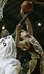 Virginia Tech's Dorenzo Hudson (5) battles for a rebound with Boston College's Joe Trapani (12). (AP Photo/The Roanoke Times, Justin Cook)