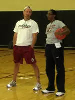 Coach Geoff Lanier and coach Angelita Forte discuss the next drill in the first practice of the season for the BC women's basketball team.