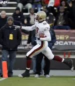 Colin Larmond rushes to the end zone. (AP Photo/Rob Carr)
