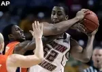 Josh Southern tries to fend off Clemson defenders. (AP Photo/Michael Dwyer)
