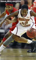 BC's Brittanny Johnson shields the ball from BU's Amarac Umez-Eronini in Monday night's second round WNIT game. BC defeated BU, 68-53. Photo courtesy of Steve McLaughlin.