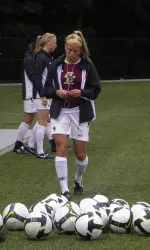 Sophomore Stephanie Wirth prepares to warm up prior to the 5-0 victory over Fairfield on Friday night.