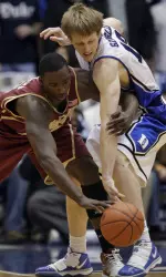 Rakim Sanders fights for a loose ball. (AP Photo)