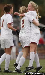 Julia Bouchelle and Victoria DiMartino celebrate with Stephanie Wirth who scored the third goal in the 3-1 victory over Hofstra in the second round NCAA Tournament match on Sunday afternoon.